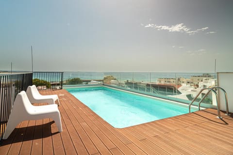 View (from property/room), Balcony/Terrace, Sea view, Swimming pool, sunbed