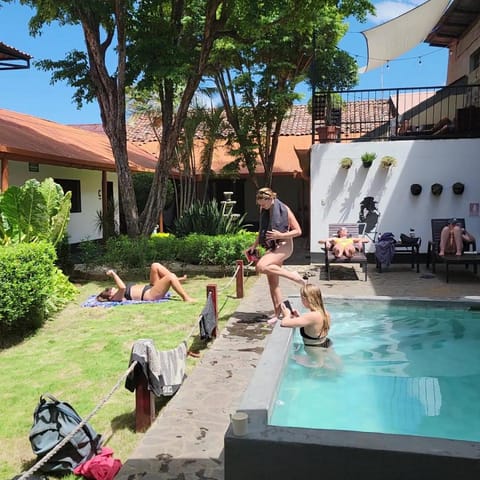 Property building, Patio, Day, Garden, Pool view, Swimming pool, group of guests