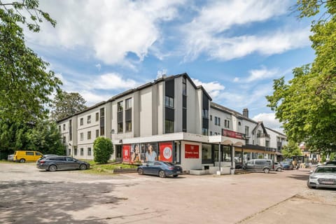 Property building, Property logo or sign, Parking, pet friendly