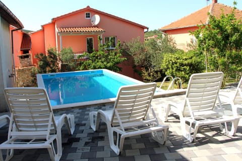House with outdoor pool in Tisno Apartment in Tisno