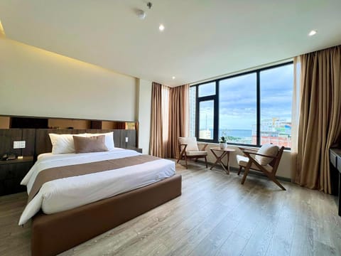 Bed, Natural landscape, Living room, Photo of the whole room, Seating area, Beach, Bedroom