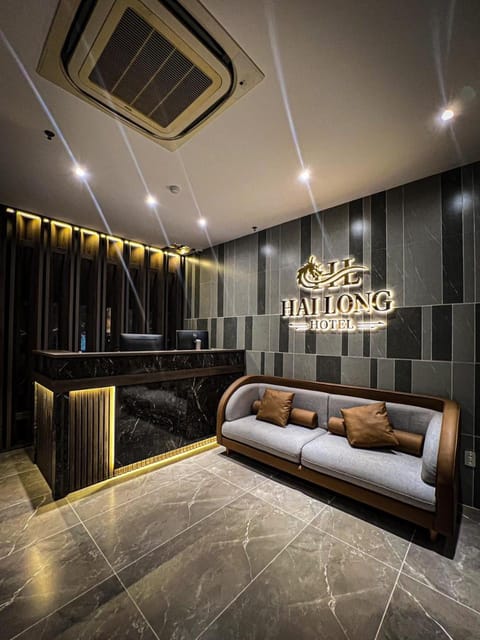 Property logo or sign, Living room, Lobby or reception, air conditioner
