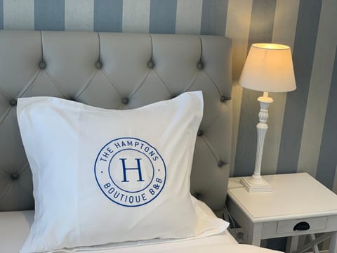 Bed, Property logo or sign