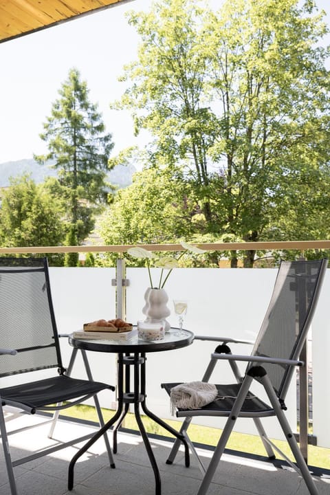 Patio, Spring, Day, Natural landscape, View (from property/room), Balcony/Terrace, Living room, Seating area, Dining area, Garden view, sunbed