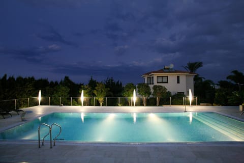 Property building, Night, Pool view, Swimming pool, Swimming pool, sunbed