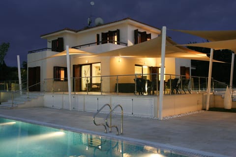 Property building, Patio, Night, Swimming pool