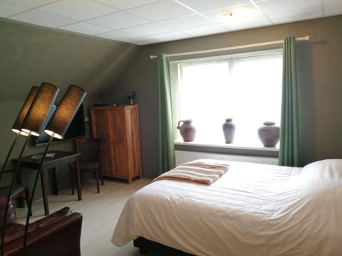 Bed, Dining area, Garden view