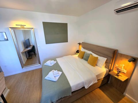 Bed, Photo of the whole room, Bedroom, towels, air conditioner