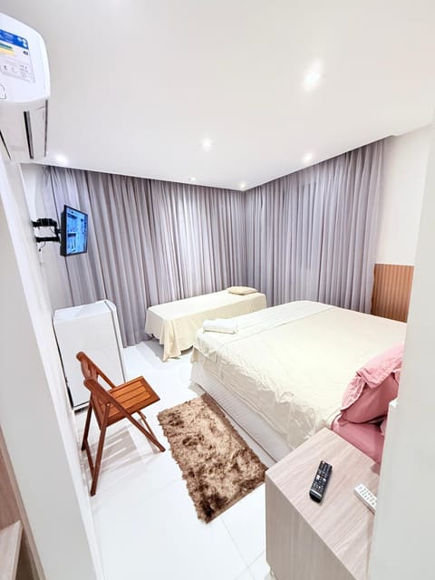 Property building, Bed, People, Photo of the whole room, Bedroom, hair dryier, minibar, towels, air conditioner