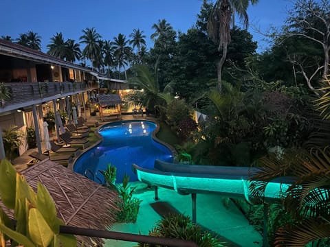 Property building, Night, Pool view, Swimming pool