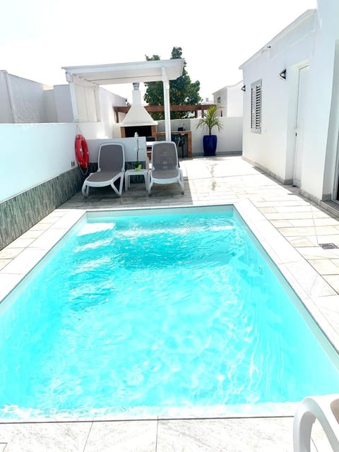 Patio, Day, Pool view, Swimming pool, sunbed