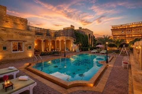 Property building, Day, Natural landscape, Pool view, Swimming pool, Sunrise, Sunset, sunbed