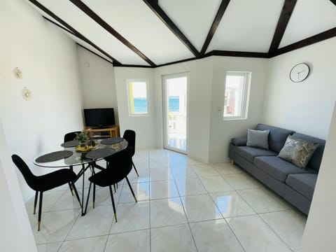 View (from property/room), Living room, Seating area, Dining area