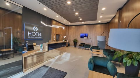 Property building, Property logo or sign, TV and multimedia, Lobby or reception, Text overlay, Certificate/Award