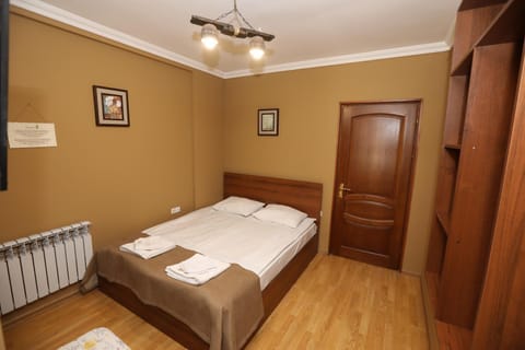 Bed, Photo of the whole room, towels, wardrobe