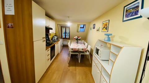 Kitchen or kitchenette, Dining area, dishwasher, oven, stove, washing machine