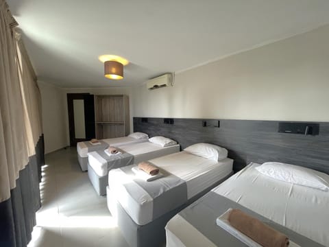 Bed, Photo of the whole room, Bedroom, towels, air conditioner