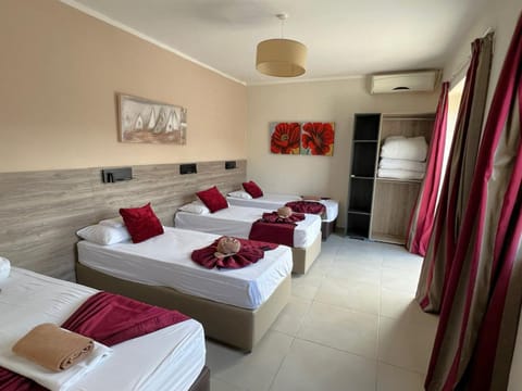 Bed, Photo of the whole room, Bedroom, towels, air conditioner