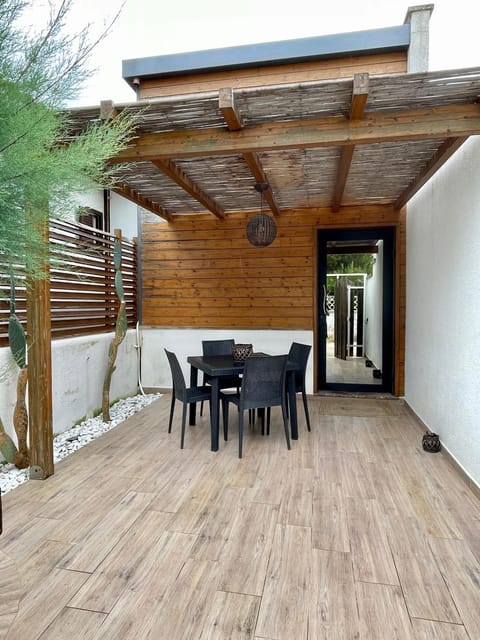 Property building, Patio, Day, Dining area