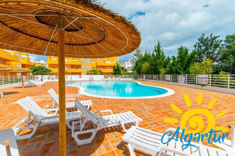 Swimming pool, sunbed