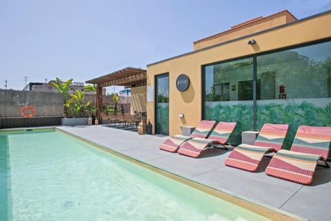 Swimming pool, sunbed