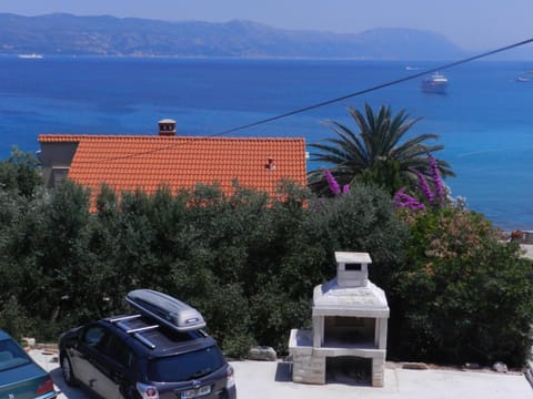 Patio, BBQ facilities, Beach, Sea view