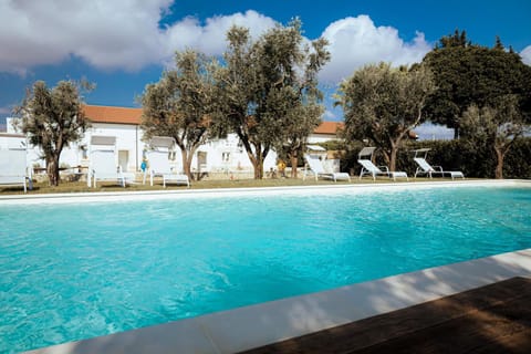 Property building, Pool view, Swimming pool, sunbed