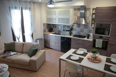 Balcony/Terrace, Kitchen or kitchenette, Living room, Seating area, Dining area, Communal kitchen, furniture, oven, stove, toaster, washing machine, kitchen