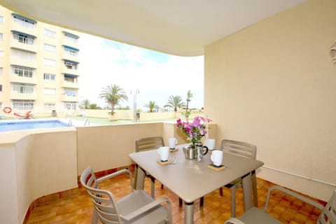 Balcony/Terrace, Seating area, Dining area, Pool view