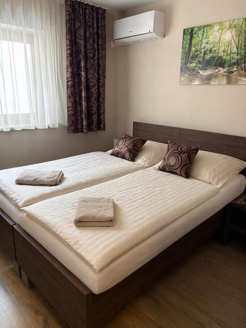 Bed, Photo of the whole room, Bedroom, towels, air conditioner