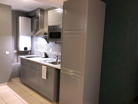 Kitchen or kitchenette, stove