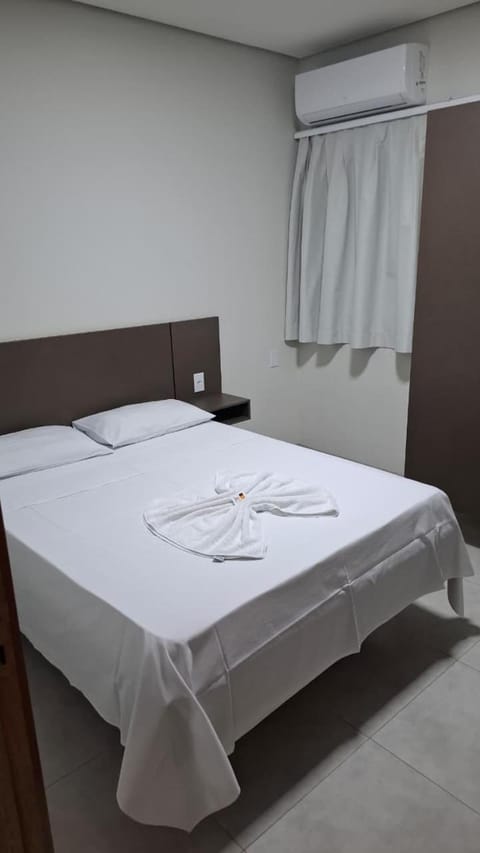 Bed, Photo of the whole room, Bedroom, towels, air conditioner