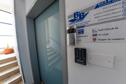 Lobby or reception, Text overlay, elevator