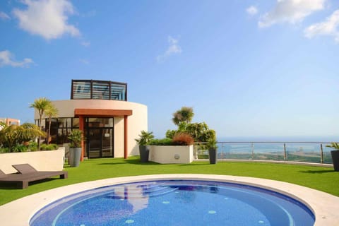 Property building, View (from property/room), Garden view, Pool view, Sea view, Swimming pool