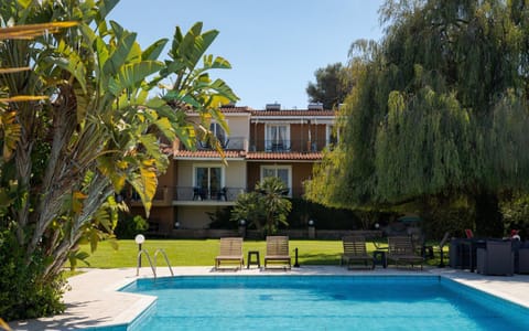 Property building, Natural landscape, Garden, Garden view, Pool view, Swimming pool, sunbed
