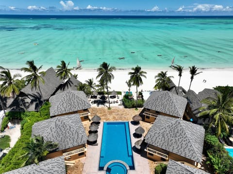 Property building, Beach, Beach, Swimming pool, Swimming pool
