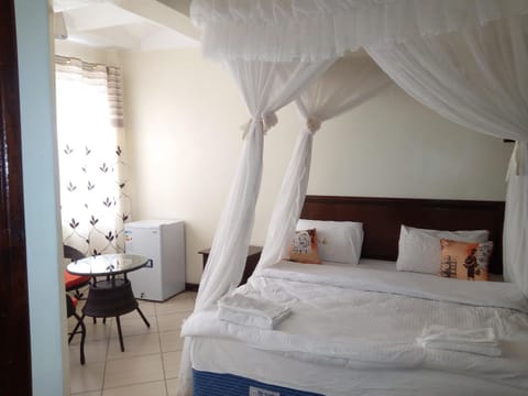 Bed, Seating area, Bedroom