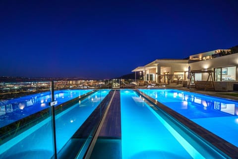 Property building, Night, Pool view, Swimming pool, sunbed