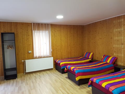 Bed, Living room, Seating area, Bedroom