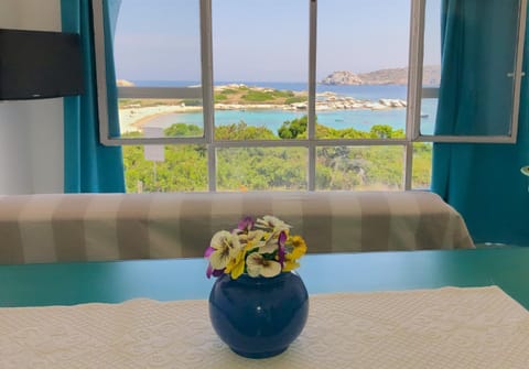 Natural landscape, View (from property/room), Living room, Seating area, Sea view