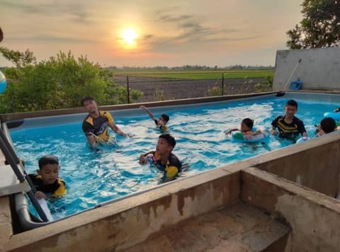 People, Natural landscape, Pool view, Swimming pool, Sunset, children, group of guests