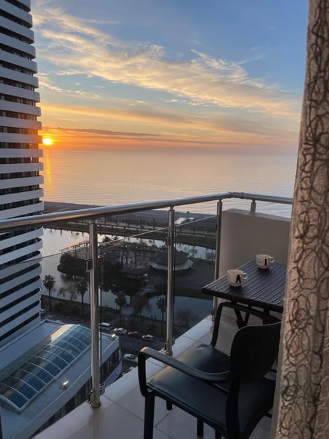 View (from property/room), Balcony/Terrace, Seating area, Sea view, Sunset
