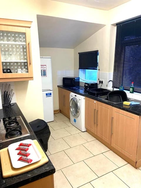 Kitchen or kitchenette, oven, stove