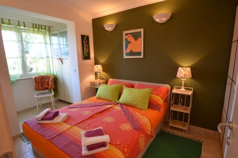 Bed, Living room, Seating area, Bedroom