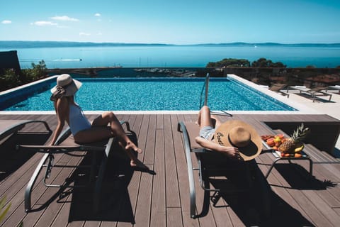 View (from property/room), Pool view, Sea view, Swimming pool, sunbed
