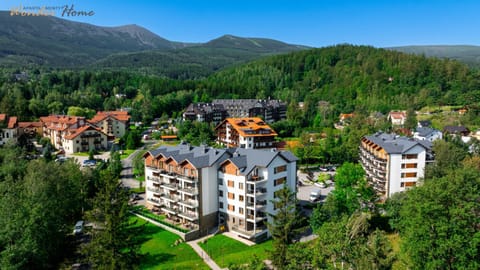 Property building, Nearby landmark, Day, Natural landscape, Bird's eye view, City view, Mountain view