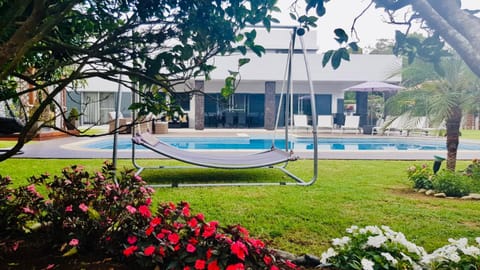 Property building, Garden, Pool view, Swimming pool