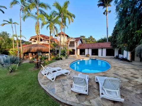 Property building, Patio, Spring, Day, Garden, Garden view, Pool view, Swimming pool, sunbed