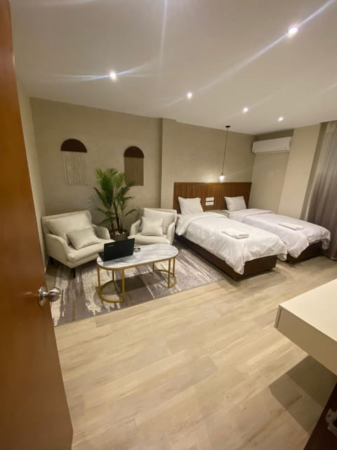 Bed, Seating area, Bedroom