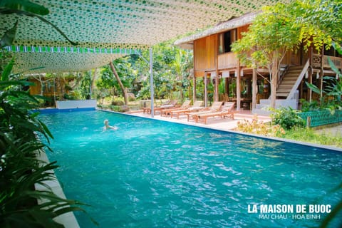 Property building, Spring, Day, Garden, Text overlay, Garden view, Pool view, Swimming pool, sunbed